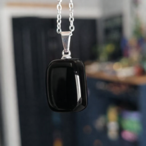 Dark Elegance – Polished Black Obsidian Gemstone Pendant”